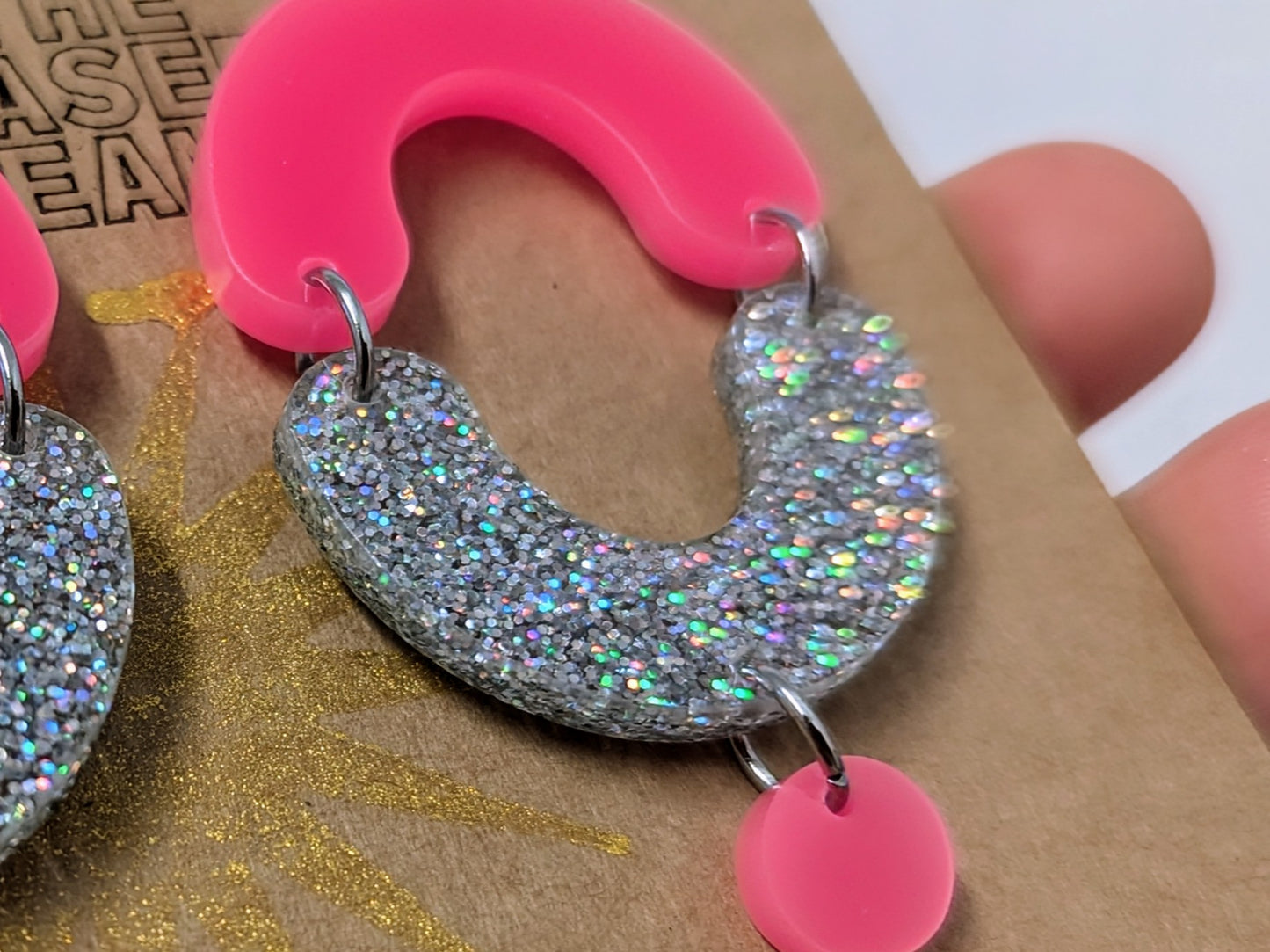 Boop earrings neon pink and holographic glitter.