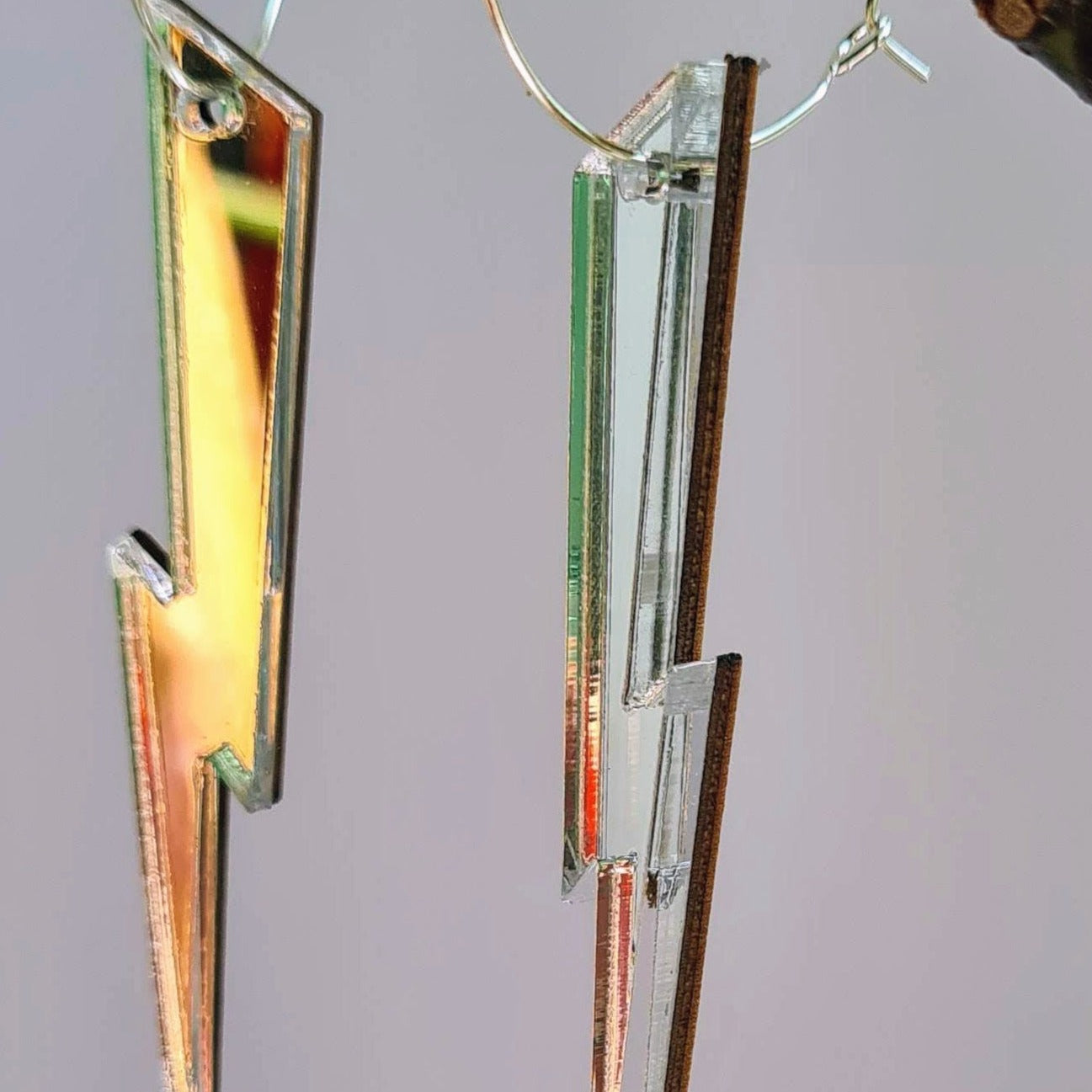 Long slender lightning bolt earrings. Silver mirror, sterling silver ear hoops available.