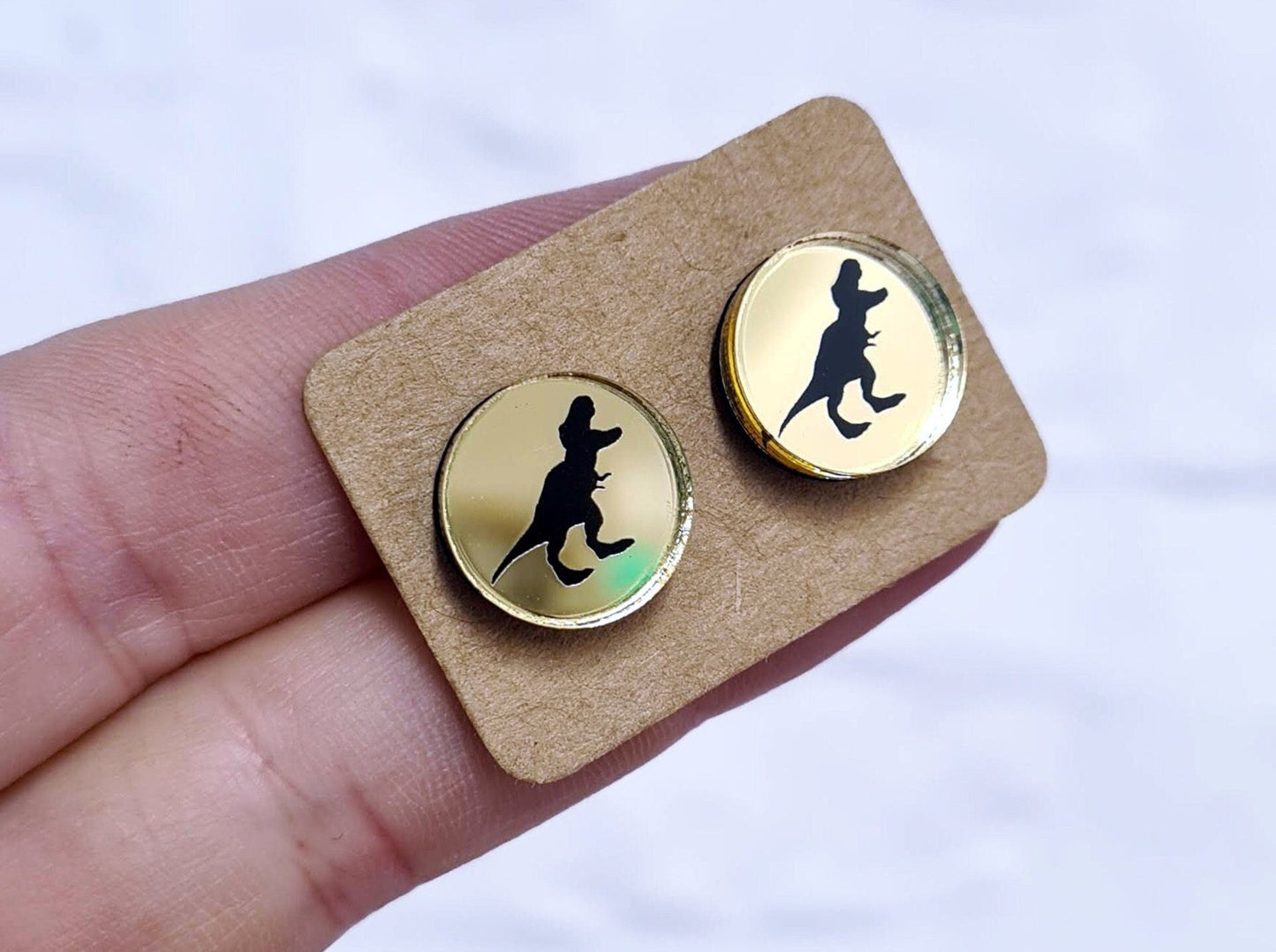 T Rex mirror studs in gold or silver. Dinosaur earrings, Dinosaur studs, T-Rex earrings, T-rex studs, Dinosaur jewellery, Dino studs